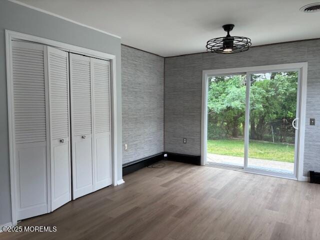 177 Freeport Blvd, Toms River, NJ 08757 - unfurnished dining area featuring wood finished floors, a ceiling fan, and baseboards