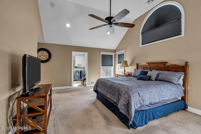 carpeted bedroom featuring visible vents, baseboards, high vaulted ceiling, and ceiling fan