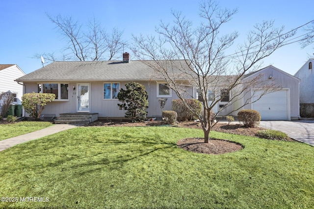 ranch-style house with a garage, driveway, a chimney, and a front yard