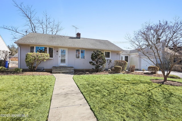 single story home featuring a front yard, a garage, roof with shingles, and a chimney