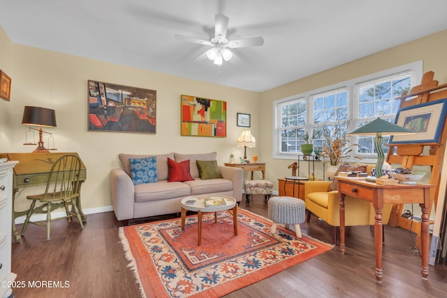 living room with ceiling fan, wood finished floors, and baseboards