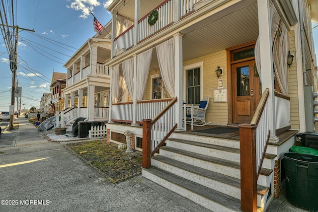 doorway to property with a porch