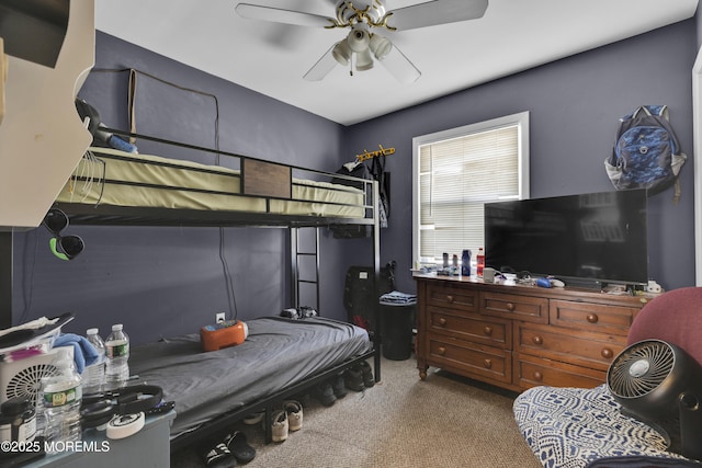 carpeted bedroom featuring a ceiling fan