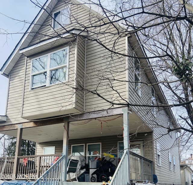 view of home's exterior featuring a porch