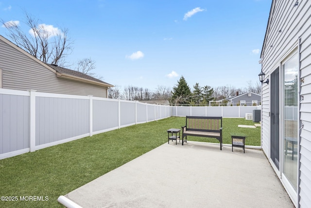 view of patio featuring central AC unit and a fenced backyard