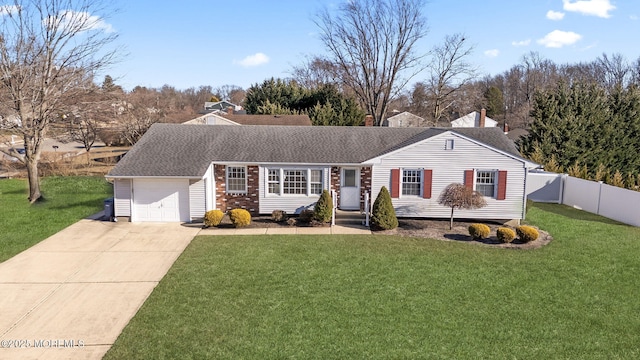 single story home with fence, concrete driveway, roof with shingles, a front yard, and a garage