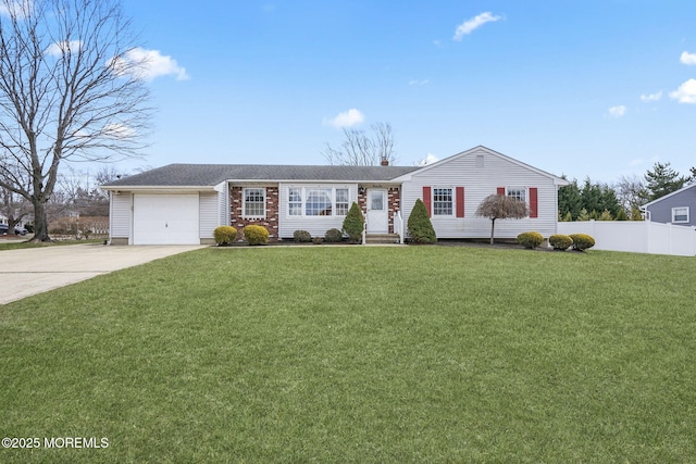 ranch-style house featuring a front yard, an attached garage, fence, and driveway