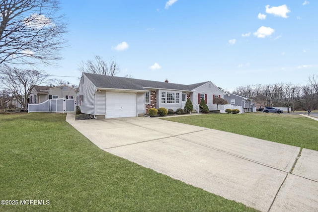 single story home with a garage, a front yard, driveway, and fence