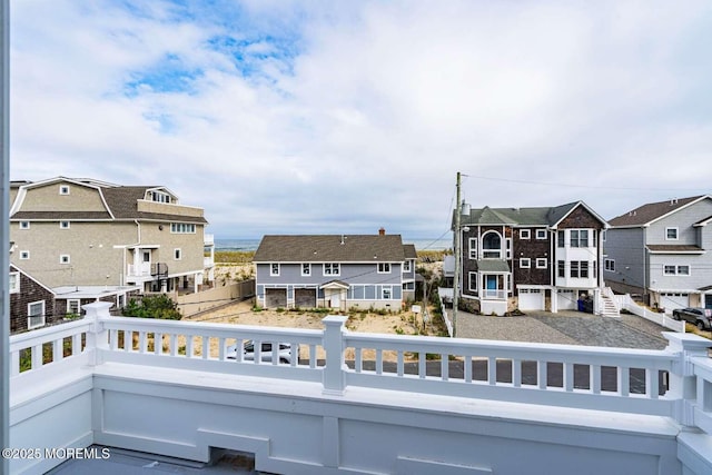 balcony featuring a residential view