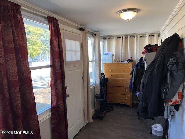 mudroom with wood finished floors