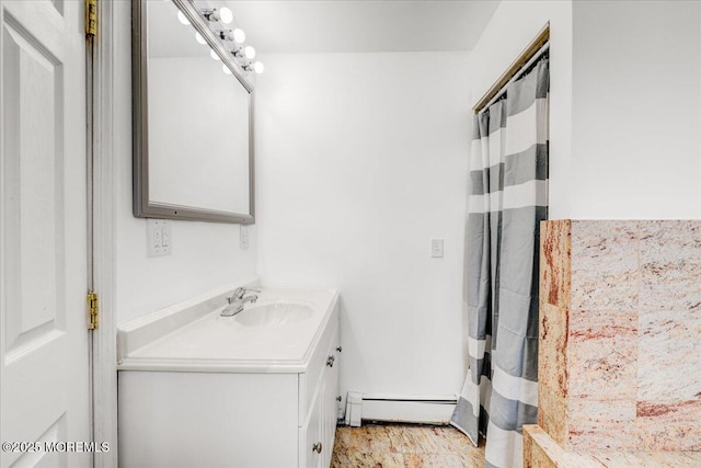 full bath with a baseboard heating unit, vanity, and a shower with shower curtain