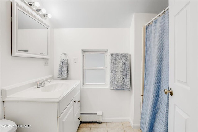 full bathroom featuring toilet, baseboard heating, vanity, tile patterned flooring, and baseboards