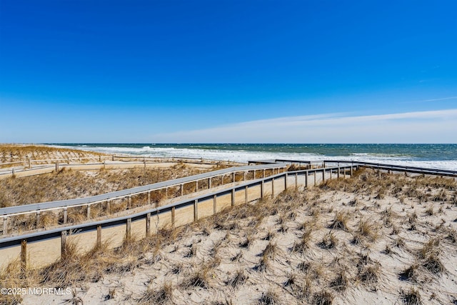 property view of water featuring a view of the beach