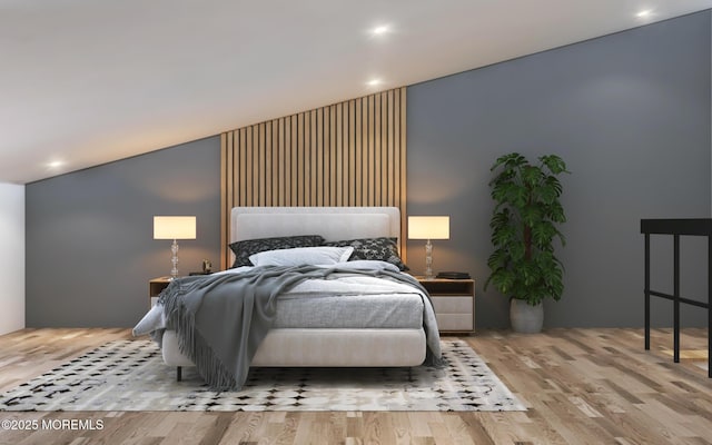 bedroom featuring recessed lighting and wood finished floors