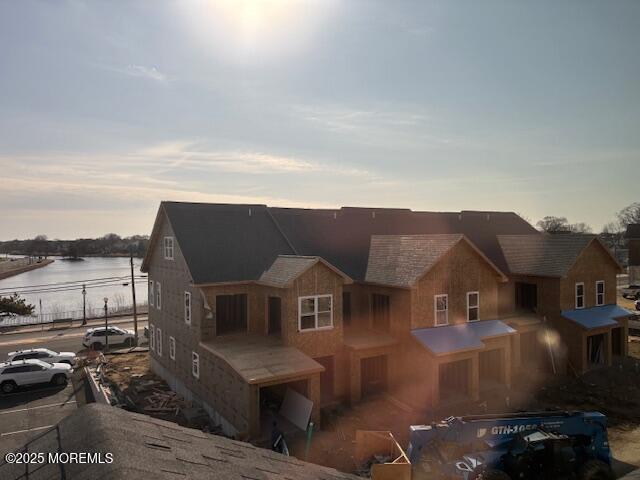 view of front facade featuring a water view