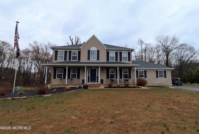 view of front of home featuring a porch and a front yard
