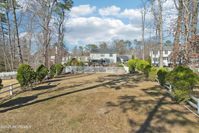 exterior space with a fenced backyard