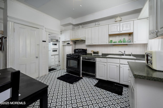 75 Highland Ave, Highlands, NJ 07732 - kitchen with dark countertops, backsplash, black appliances, and a sink