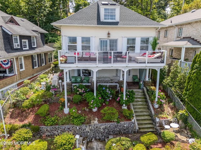 75 Highland Ave, Highlands, NJ 07732 - back of house with stairway and a shingled roof