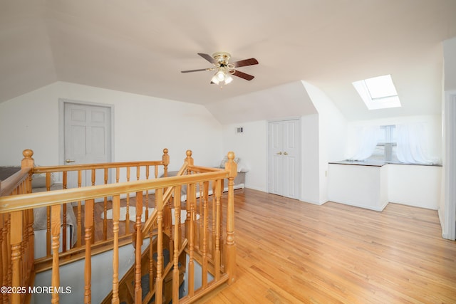 75 Highland Ave, Highlands, NJ 07732 - additional living space with lofted ceiling with skylight, light wood-style floors, and a ceiling fan