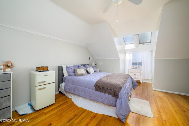 75 Highland Ave, Highlands, NJ 07732 - bedroom featuring light wood finished floors, baseboards, ceiling fan, and vaulted ceiling