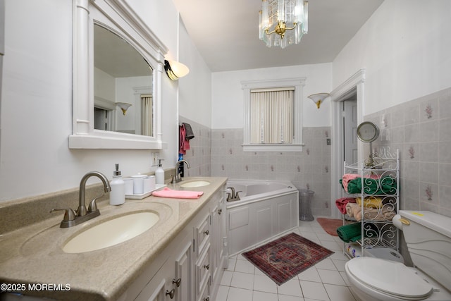 75 Highland Ave, Highlands, NJ 07732 - full bath with tile patterned flooring, tile walls, a garden tub, and a sink