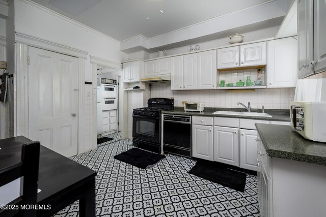75 Highland Ave, Highlands, NJ 07732 - kitchen featuring decorative backsplash, black appliances, dark countertops, and a sink