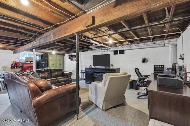 living room featuring speckled floor