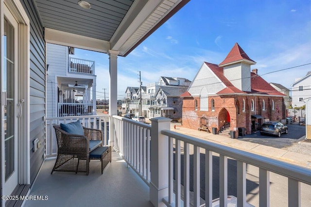 balcony featuring a residential view