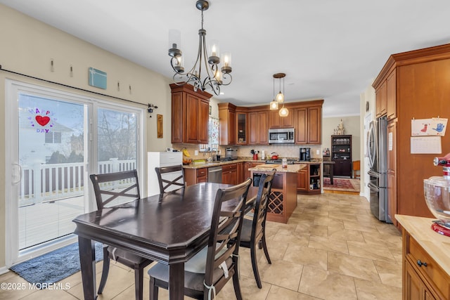 dining space featuring a chandelier