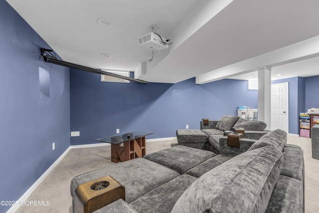 cinema room featuring carpet floors and baseboards