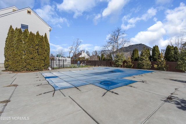 view of pool with a patio, fence, and a fenced in pool