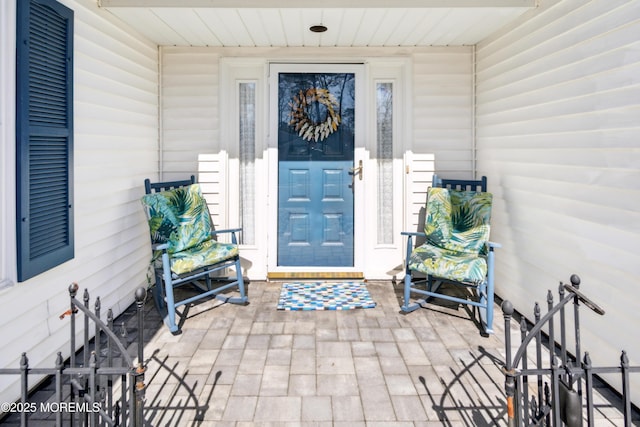 entrance to property with a porch