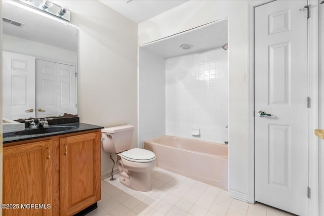 full bath with toilet, visible vents, vanity, tub / shower combination, and tile patterned floors