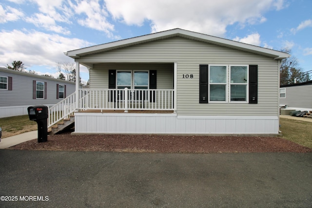 manufactured / mobile home with covered porch