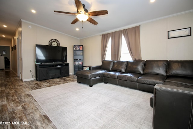 living room with ceiling fan, lofted ceiling, ornamental molding, recessed lighting, and wood finished floors