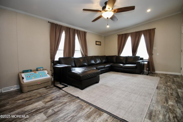 living room featuring ornamental molding, wood finished floors, recessed lighting, baseboards, and ceiling fan