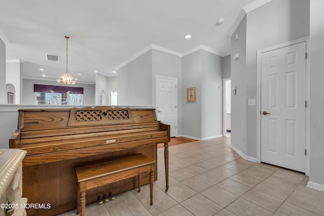 interior space with visible vents, baseboards, ornamental molding, light tile patterned floors, and an inviting chandelier