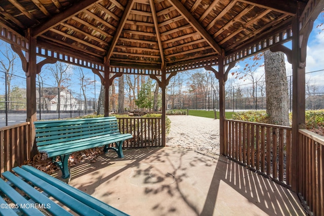 view of patio with a gazebo and fence