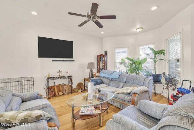 living room featuring a ceiling fan, wood finished floors, and recessed lighting