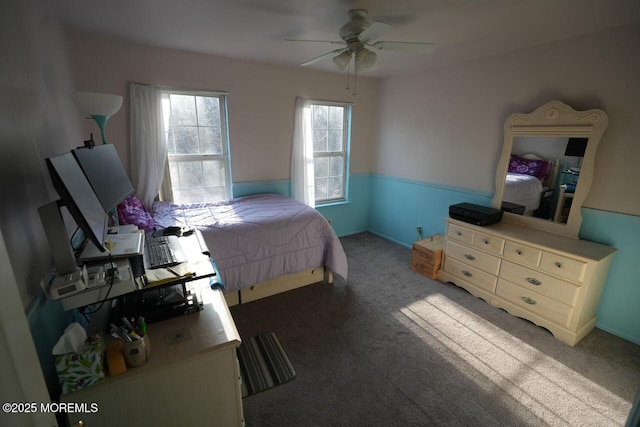 bedroom with ceiling fan and carpet