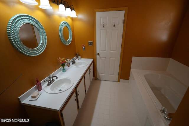 full bathroom featuring double vanity, a sink, and a bath