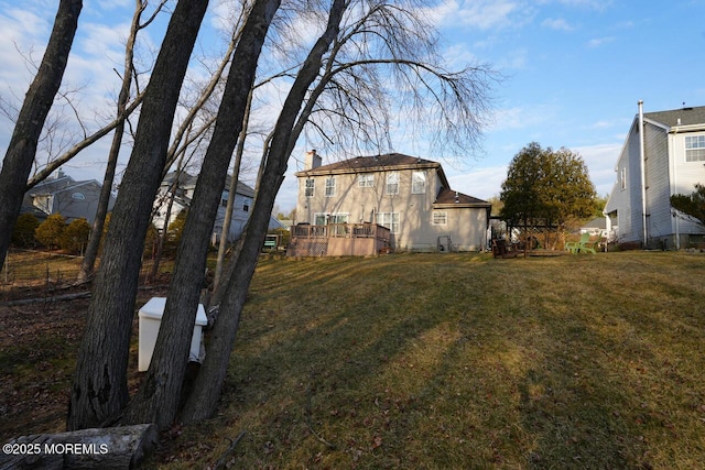 view of yard featuring a deck