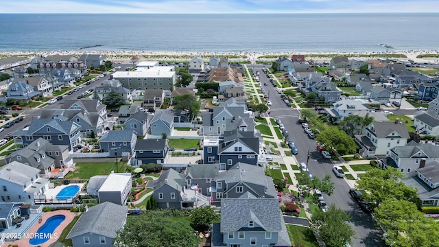 aerial view with a water view and a residential view