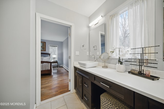 bathroom with vanity and tile patterned floors