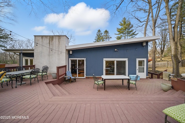 deck featuring outdoor dining area