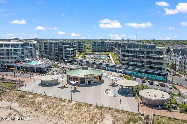 birds eye view of property with a city view