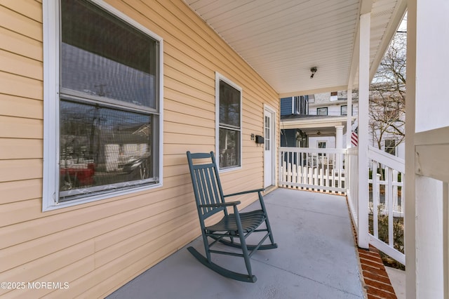 view of patio featuring a porch