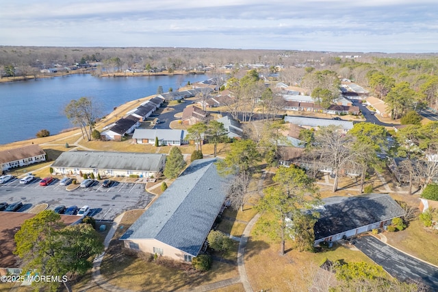 birds eye view of property featuring a residential view and a water view