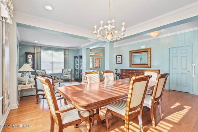 dining room featuring a notable chandelier, recessed lighting, light wood finished floors, and ornamental molding